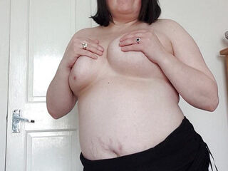 Wife disrobing off juggling enormous boobies and belly, wiggling ass