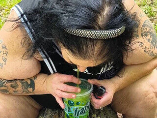 Sucking on a Straw in the forest blasting on Tree on Her Knees
