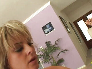 Isabel Ice and Velicity Von, both glamorous platinum-blonde women, engage in a sexual meeting while sharing a genitalia.