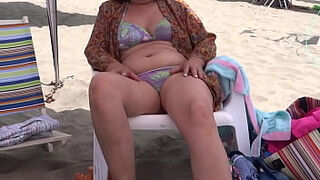 Opening Part - My 58 yr older furry wifey displays off in swimsuit on the beach&comma; masturbates&comma; wants to fuck&comma; mighty orga