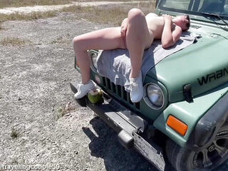 Horny teenage gal strokes outside, tugging on the fetish mask of the Jeep, insane teen,