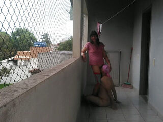 My wife taunting me on balcony
