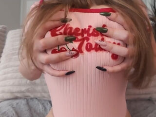 A adorable stunner with jaw-dropping large titties is getting fondled and white-juiced