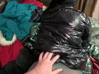 Several glistening Down-jackets Used for pummeling and tugging 267